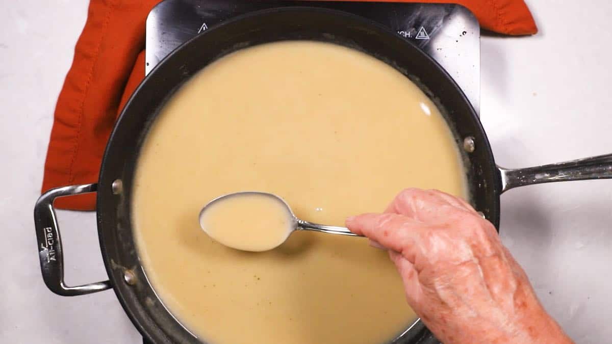 Turkey pan gravy in a skillet.