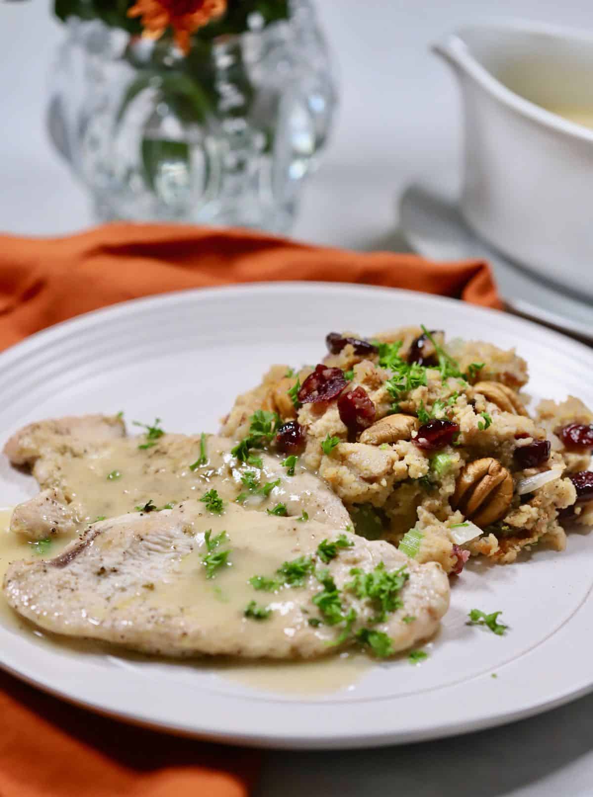 Thanksgiving turkey and dressing on a plate. 