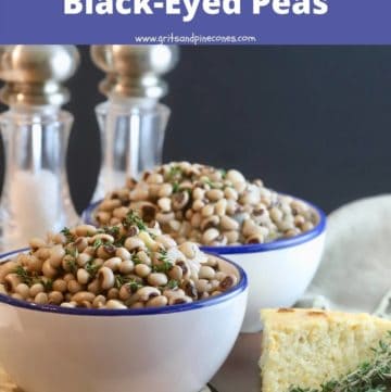 Two bowls of black-eyed-peas and a slice of cornbread.