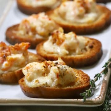 Shrimp toast on a serving plate.