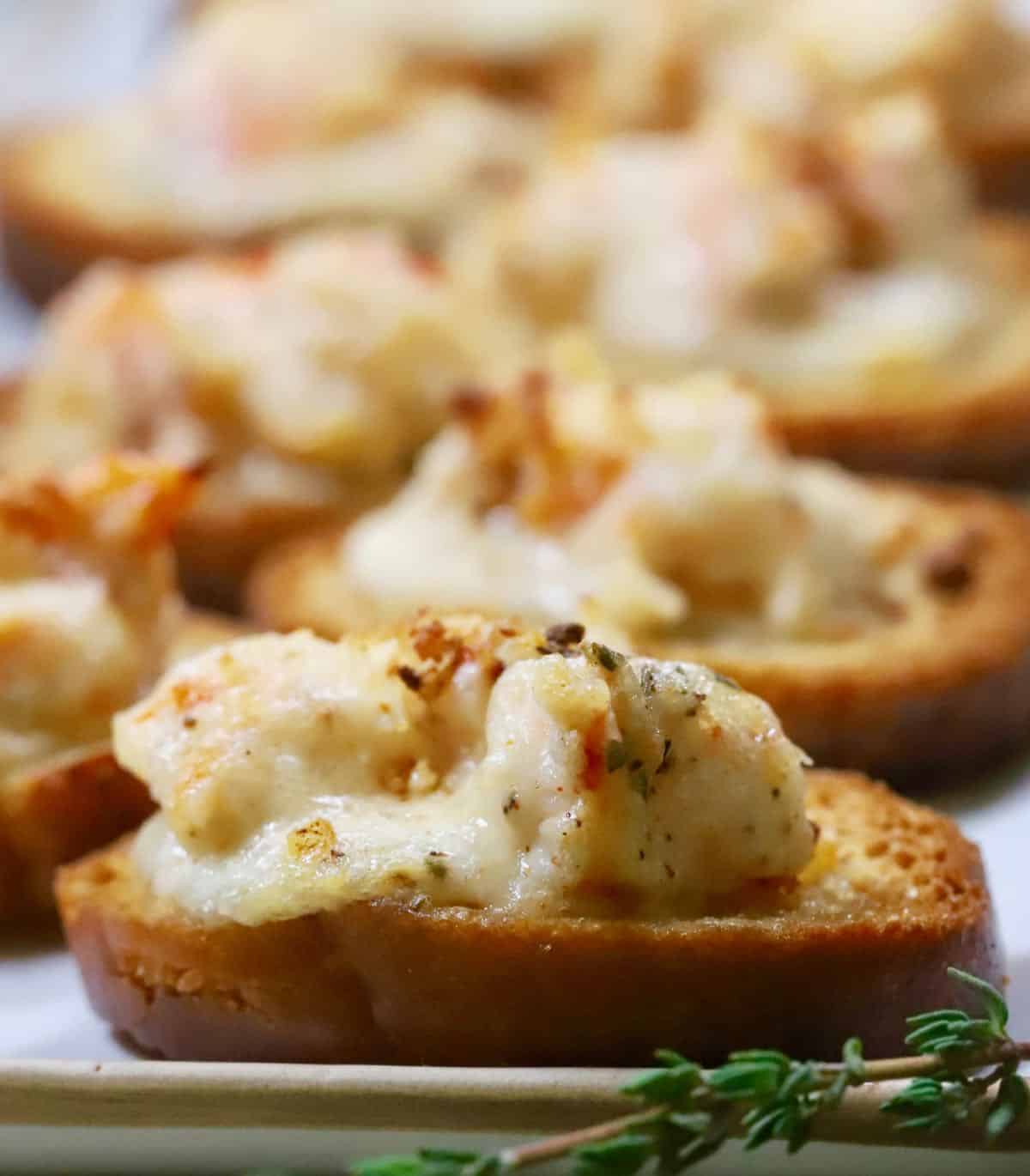 Close up of Creole Shrimp Toast on a plate. 