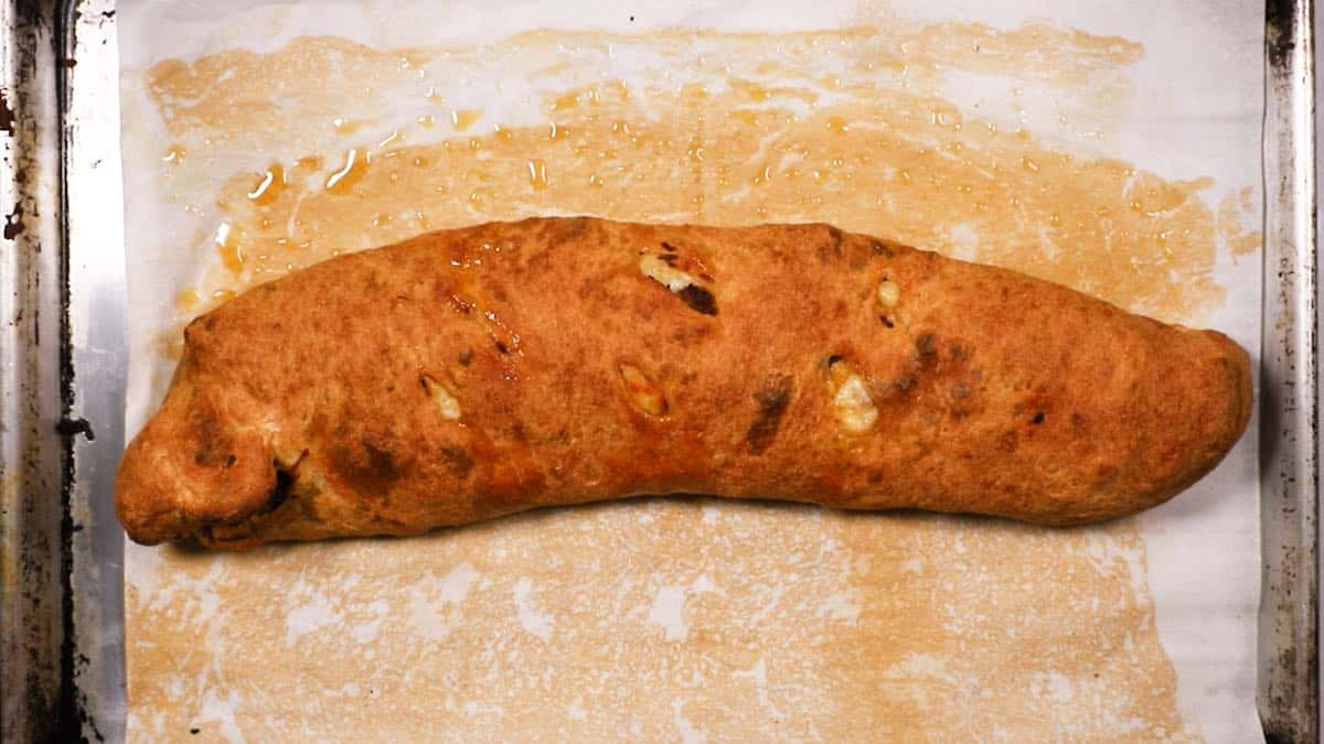 Sausage bread on a baking sheet. 