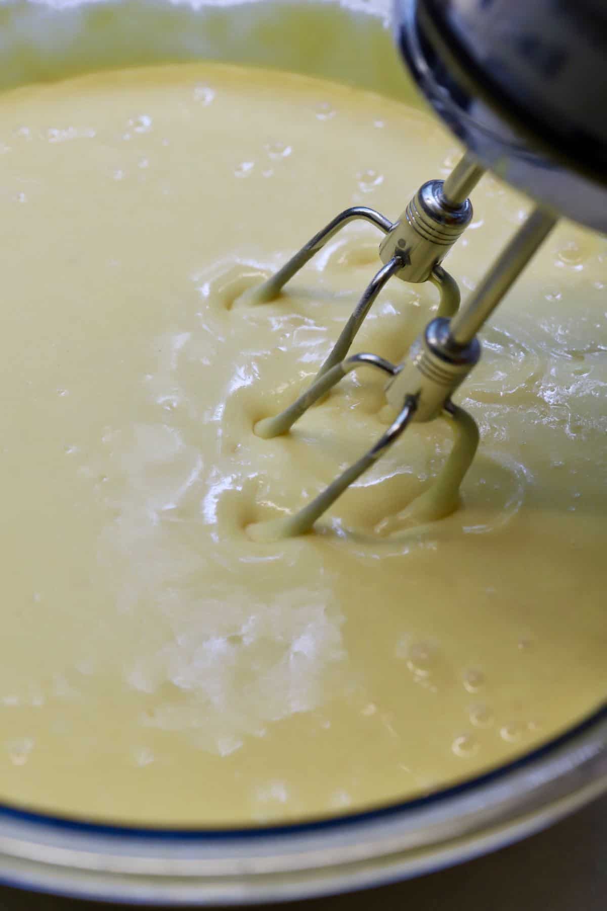 Making instant vanilla pudding in a glass bowl. 