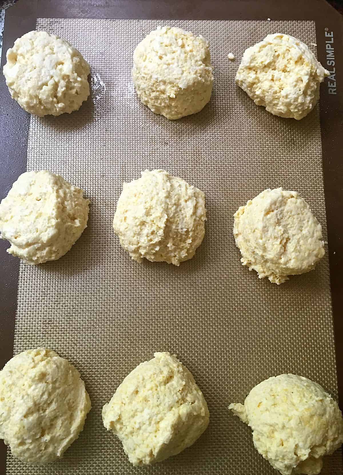 Southern shortcake biscuit dough on a baking sheet.