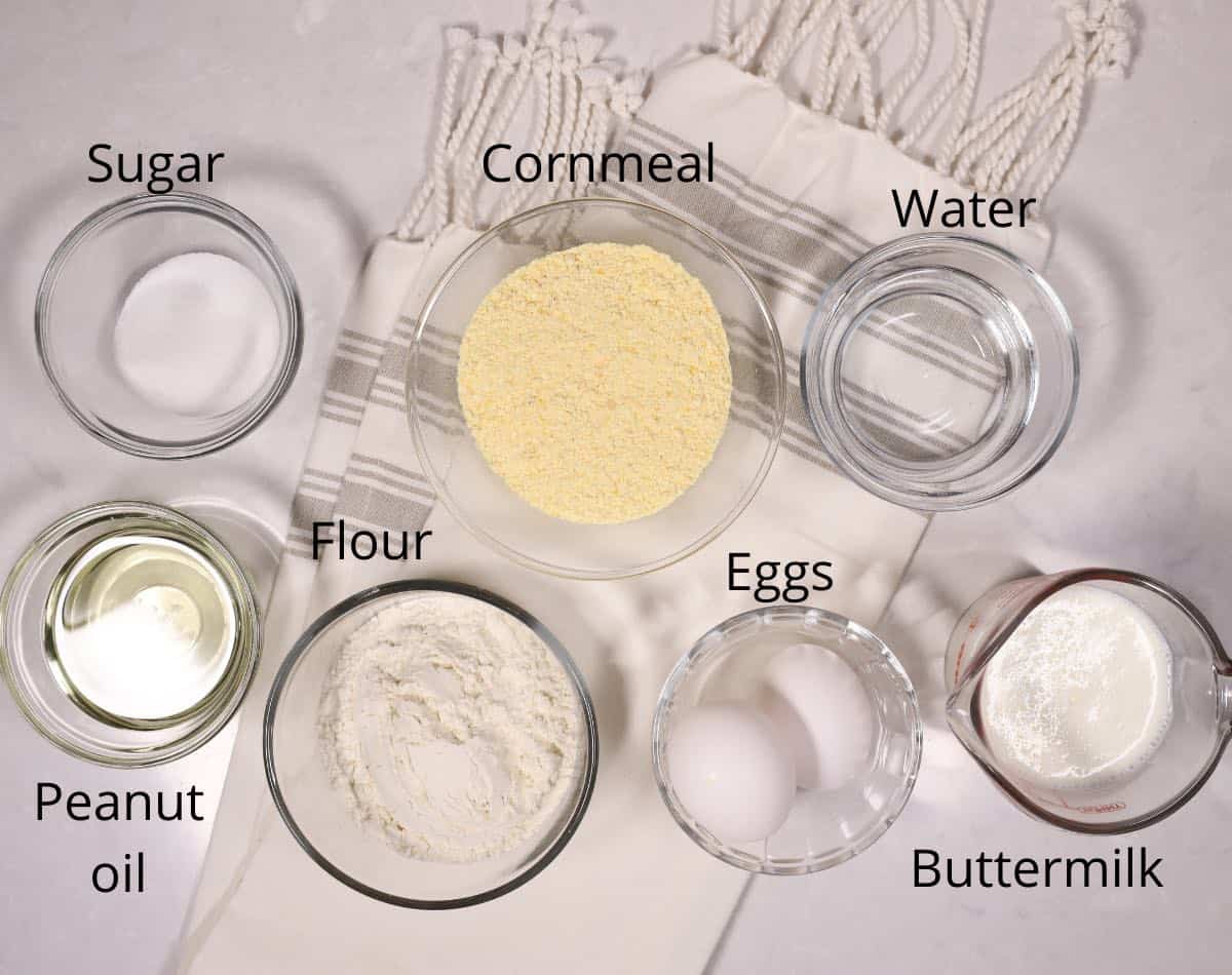 Ingredients for hoecakes, including cornmeal, flour and buttermilk. 