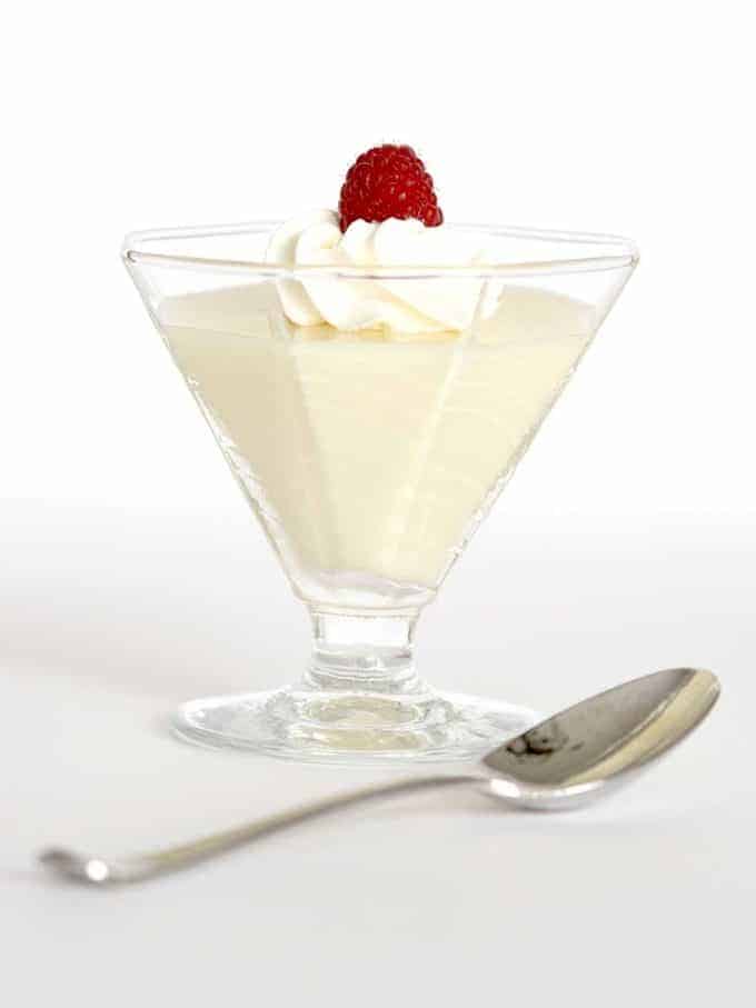 Lemon pudding in a clear glass dessert dish. 