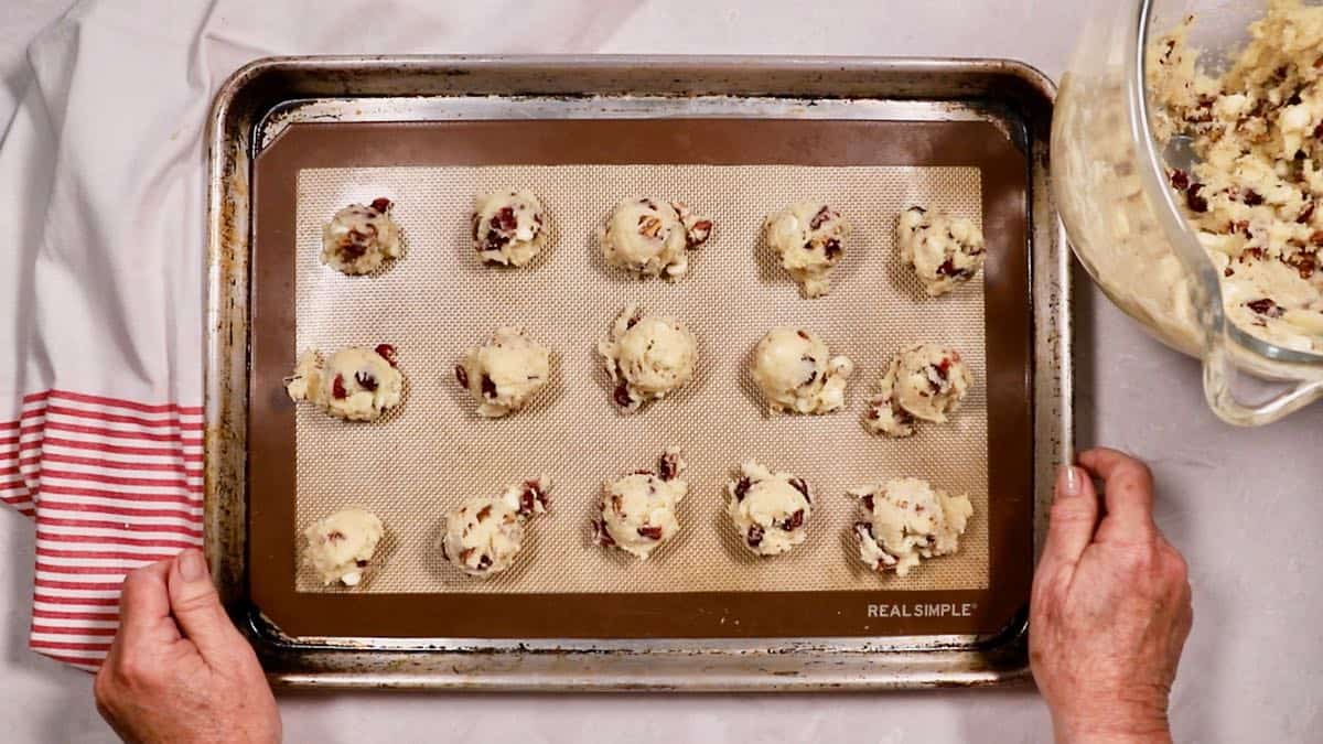 Unbaked cookies on a baking sheet.