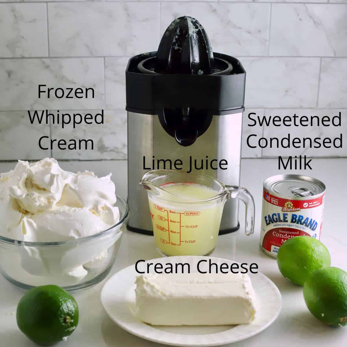 Ingredients for key lime mousse including lime juice and cream cheese. 
