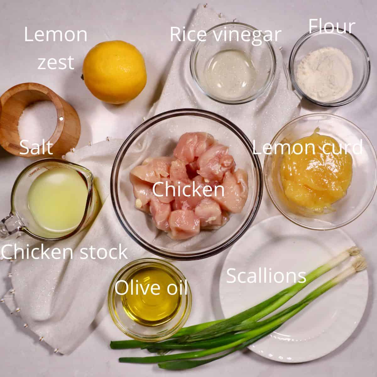 Ingredients for Lemon Curd Chicken including lemon curd, chicken pieces and flour. 