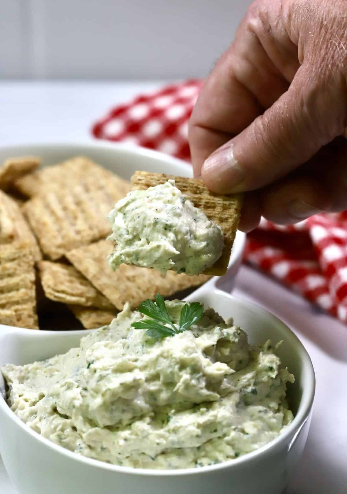 A scoop of chicken ranch dip on a Triscuit.