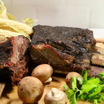 Smoked Beef Short Ribs on a cutting board.