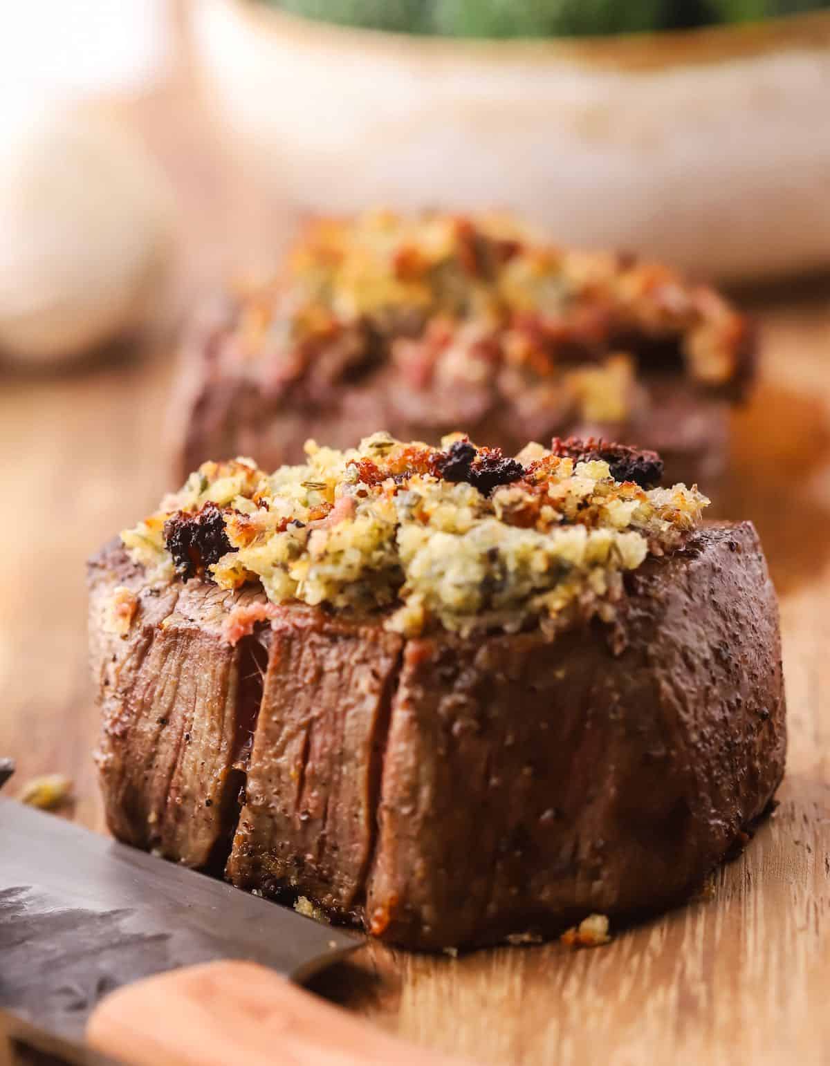 A filet mignon topped with blue cheese and panko. 