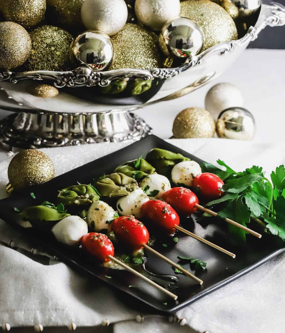 Easy Caprese Skewers with Pesto Dressing | gritsandpinecones.com