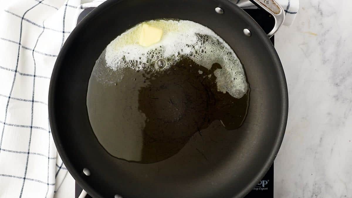 Melting butter in a skillet. 