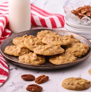 Pecan praline candy on a plate.