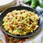 Spicy Corn Casserole in a cast-iron-skillet.