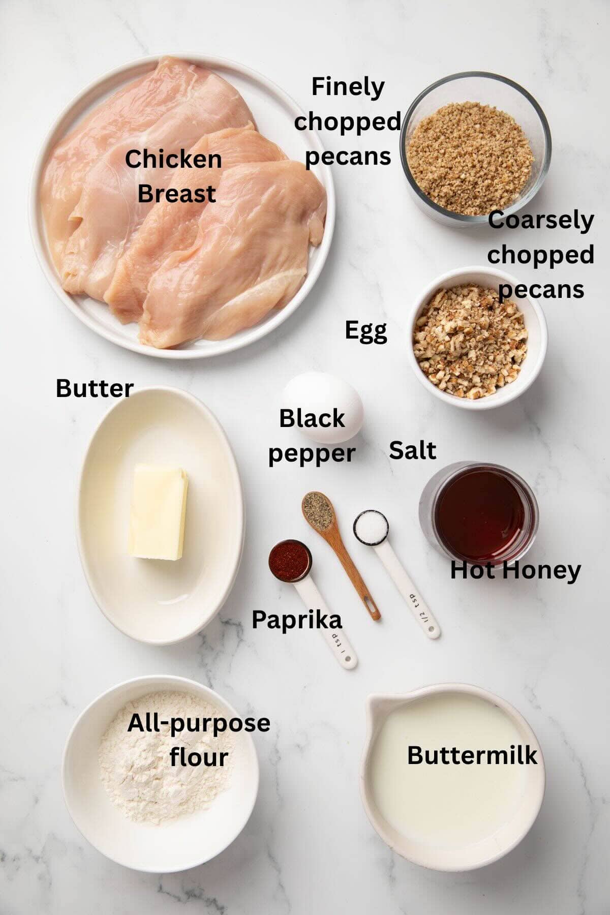 Pecan Crusted chicken ingredients include pecans, flour, buttermilk, butter, and hot honey.