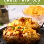 Pinterest pin showing two twice baked potatoes topped with bacon and cheese.