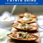 Ponterest pin showing air fried potato skins topped with sour cream and chives.