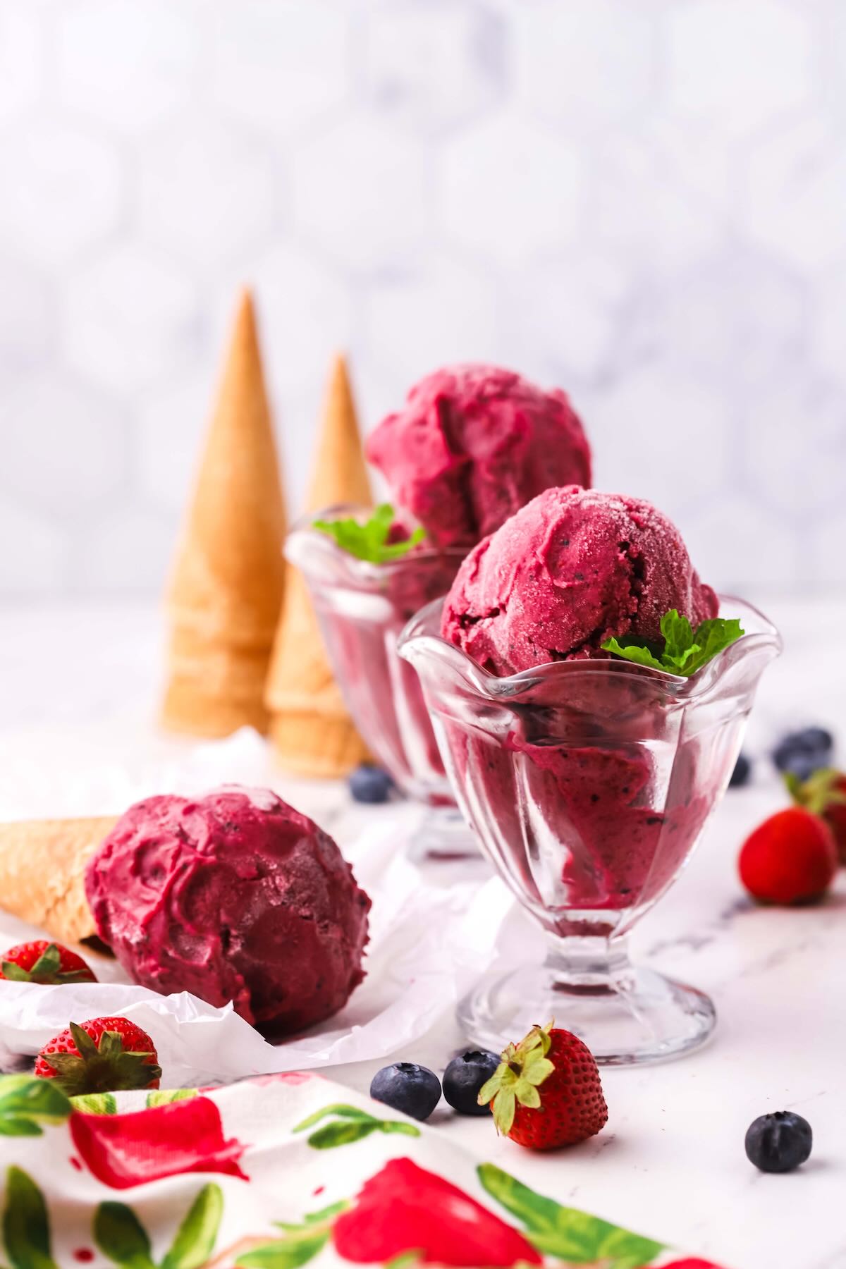 Berry sherbet in two dessert glasses.