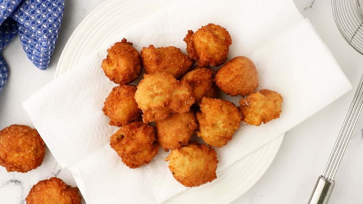 Hush puppies draining on a paper towel. 