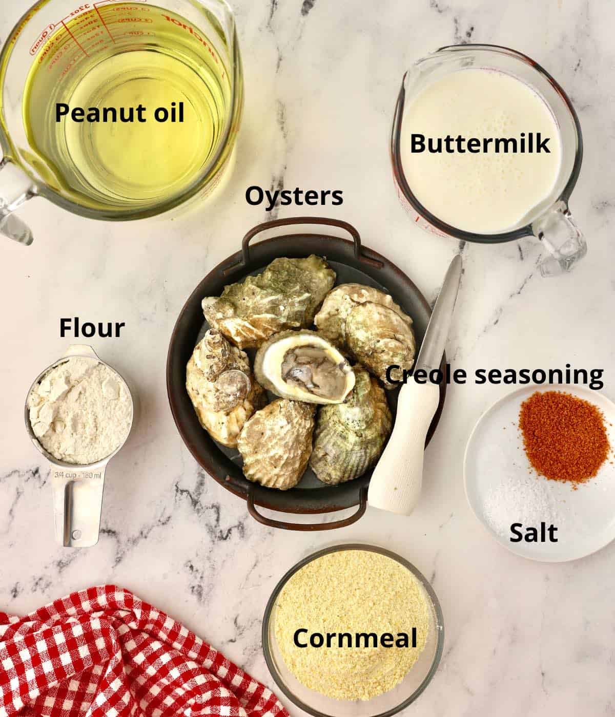 Oysters, cornmeal, buttermilk and oil for frying. 