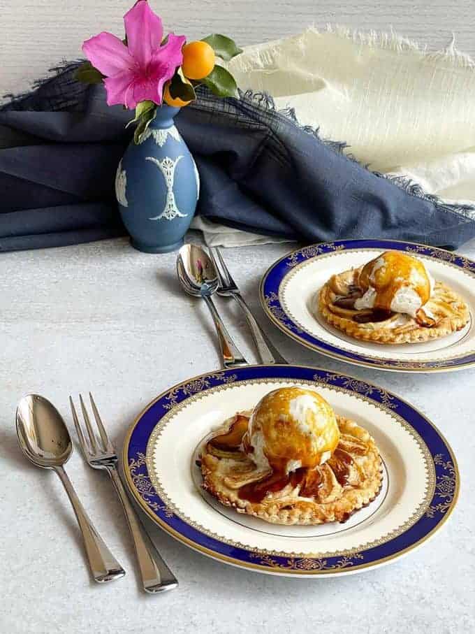 Apple Tart topped with a scoop of vanilla ice cream and a bourbon sauce. 