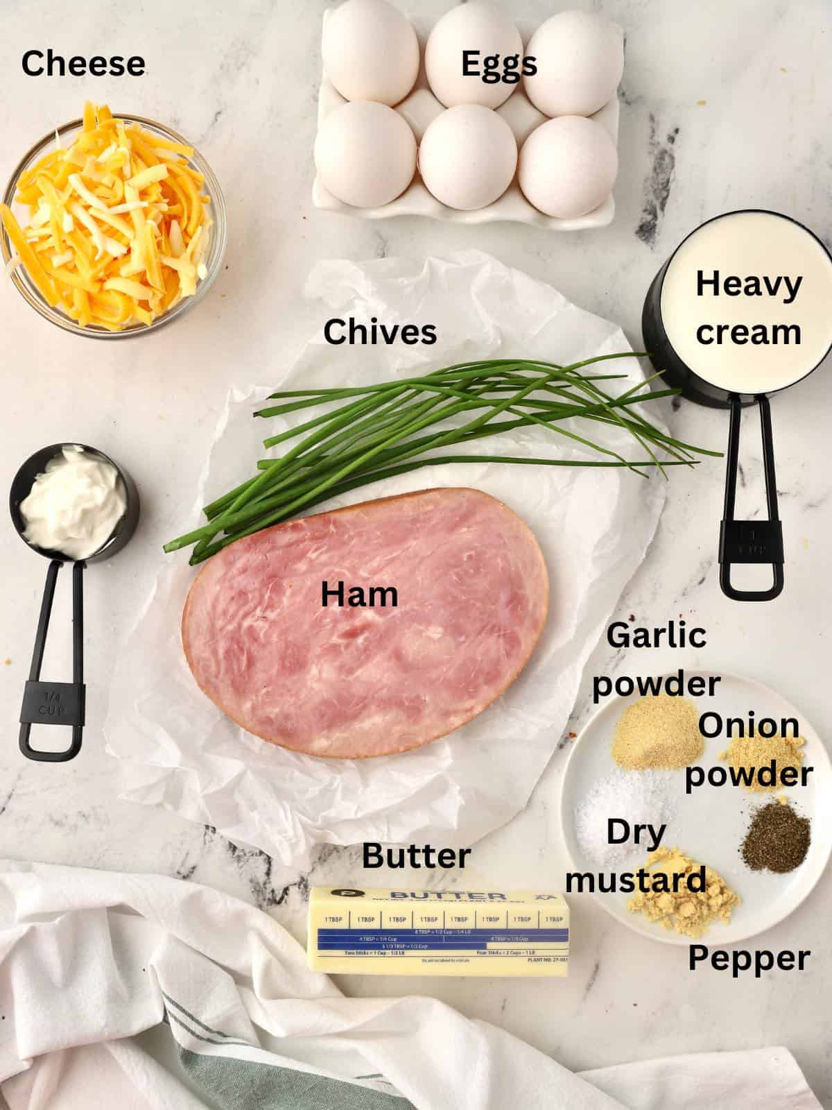 Ingredients for a ham and cheese crustless quiche. 