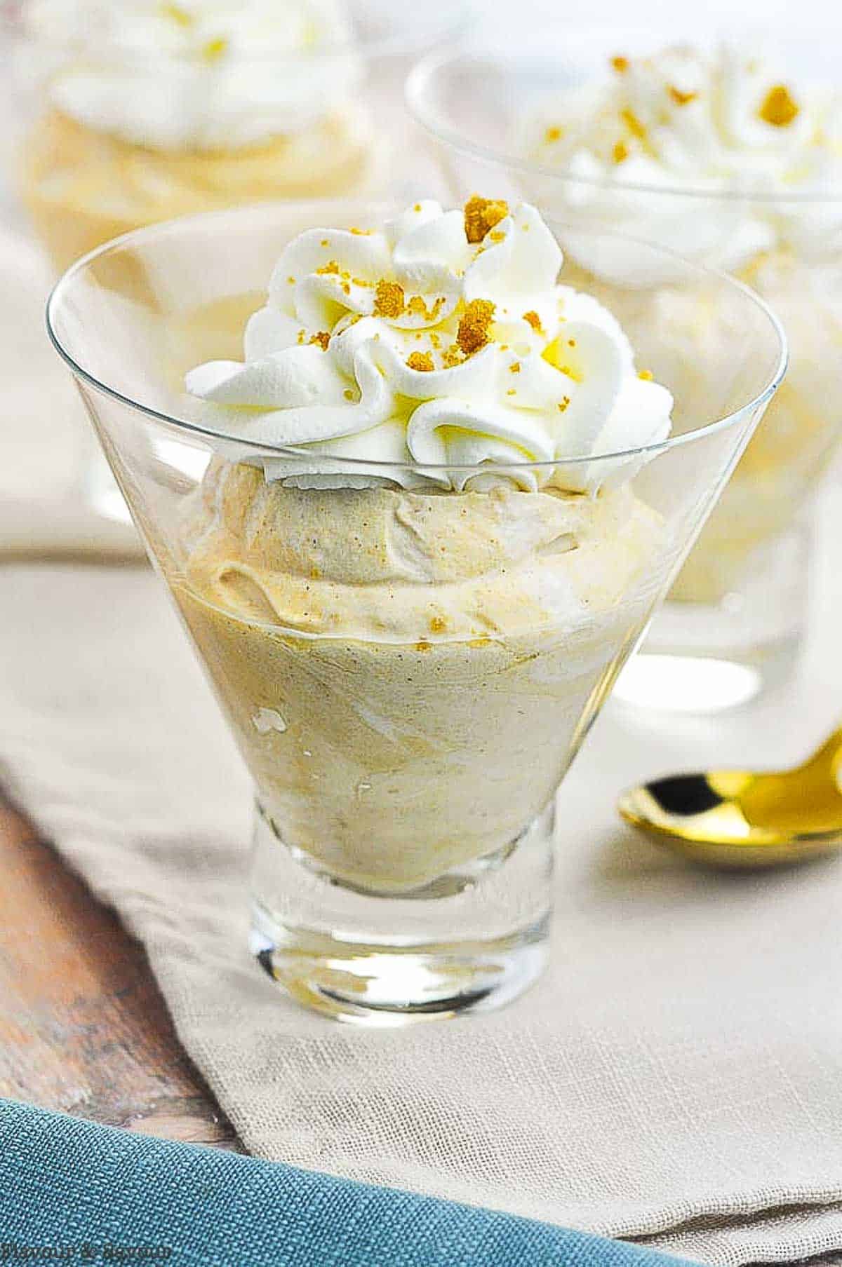 Pumpkin cheesecake in a dessert glass. 