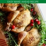 Pinterest pin showing three cornish hens on a platter garnished with rosemary and cranberries.