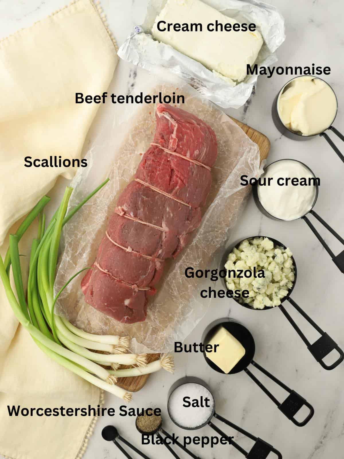 A whole beef tenderloin plus ingredients, gorgonzola cheese, cream cheese and sour cream to make a dipping sauce. 