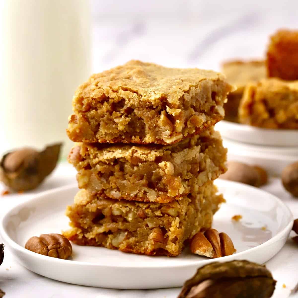 A stack of Charleston Chewies, dessert bars on a white plate.