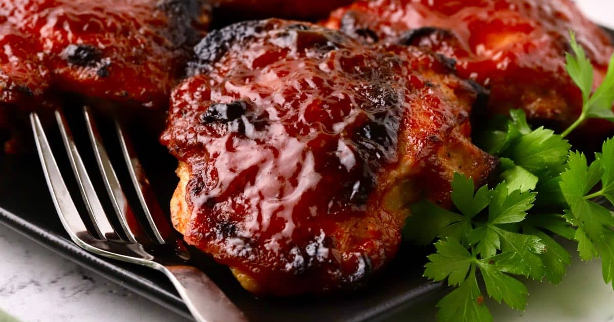 image of Easy Baked BBQ Chicken Thighs recipe by Grits and Pine Cones