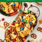 Pinterest pin showing a metal bowl full of pretzels, Cheez-its, Bugles, peanuts and M&Ms.