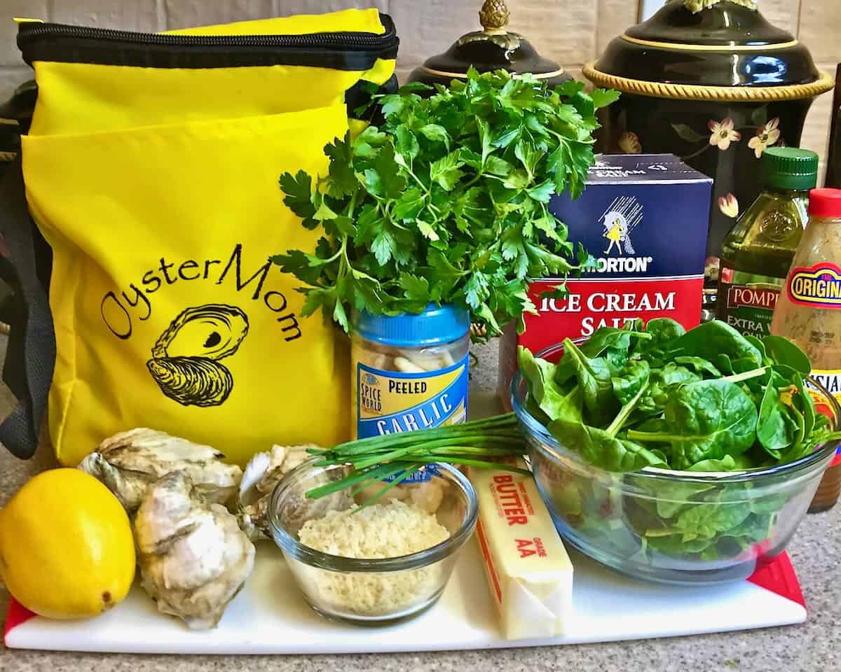 Ingredients to make oysters rockefella including spinach and parmesan cheese. 