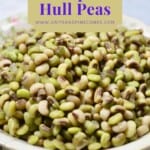 A large bowl full of cooked purple hull peas.