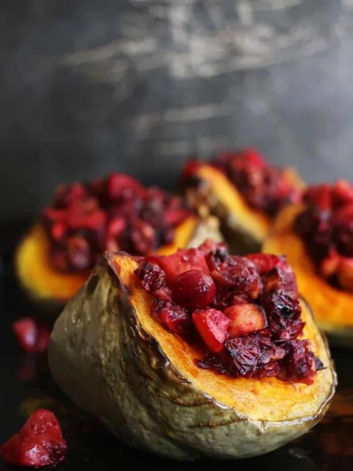 Baked squash stuffed with cranberries and apples. 