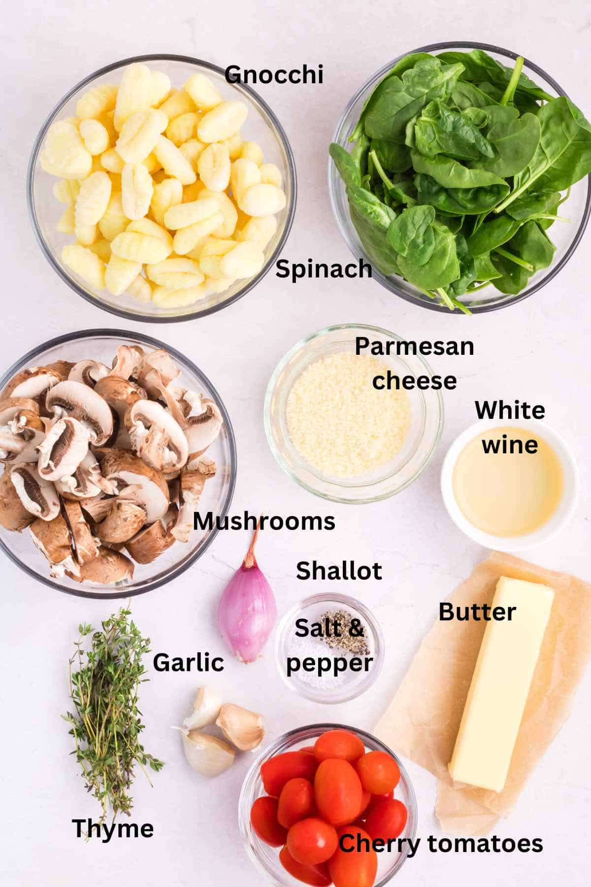 Skillet gnocchi ingredients include mushrooms, spinach, and cherry tomatoes.