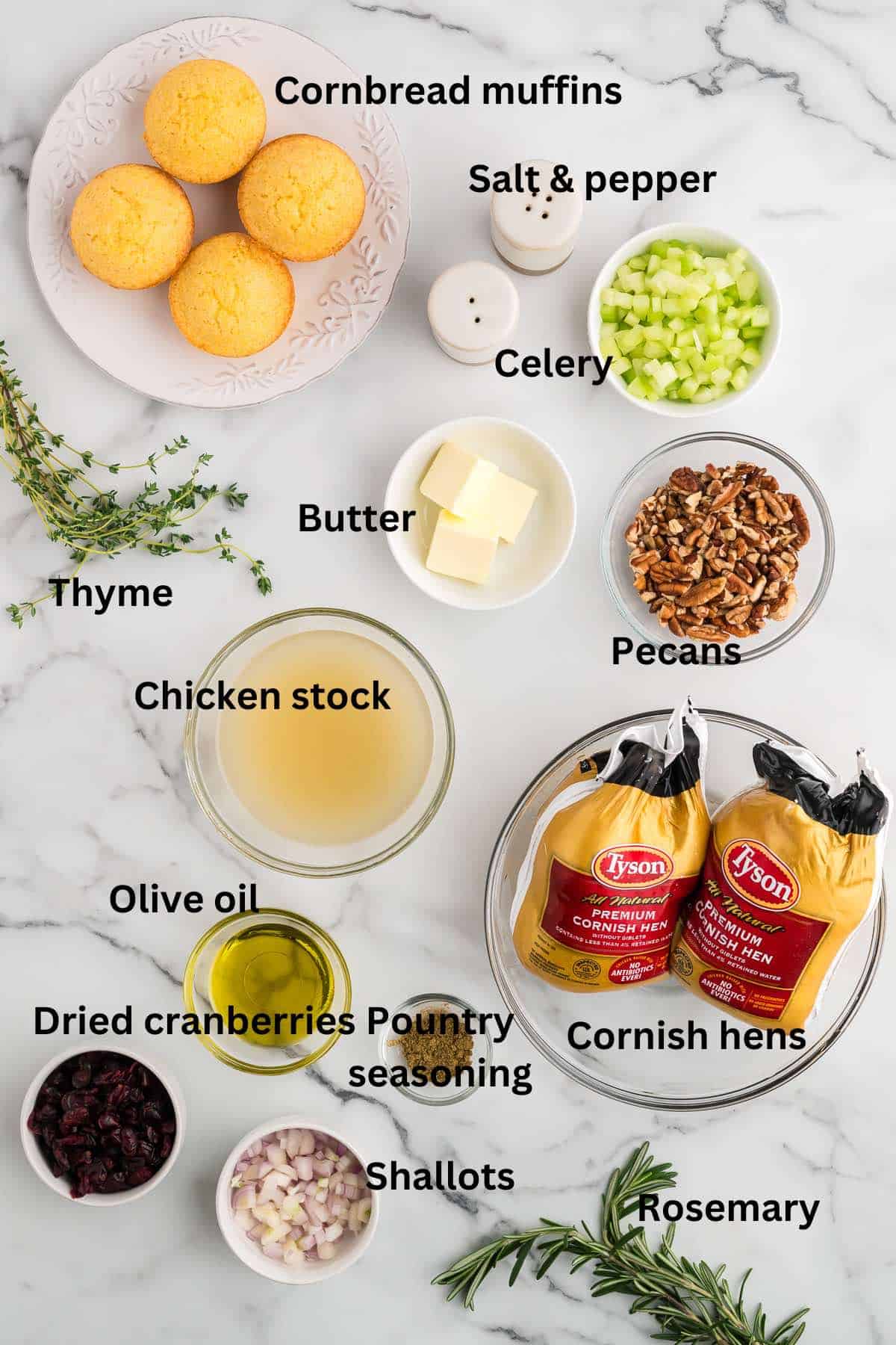 Stuffed Cornish hens ingredients include cornbread muffins, dried cranberries, and pecans.
