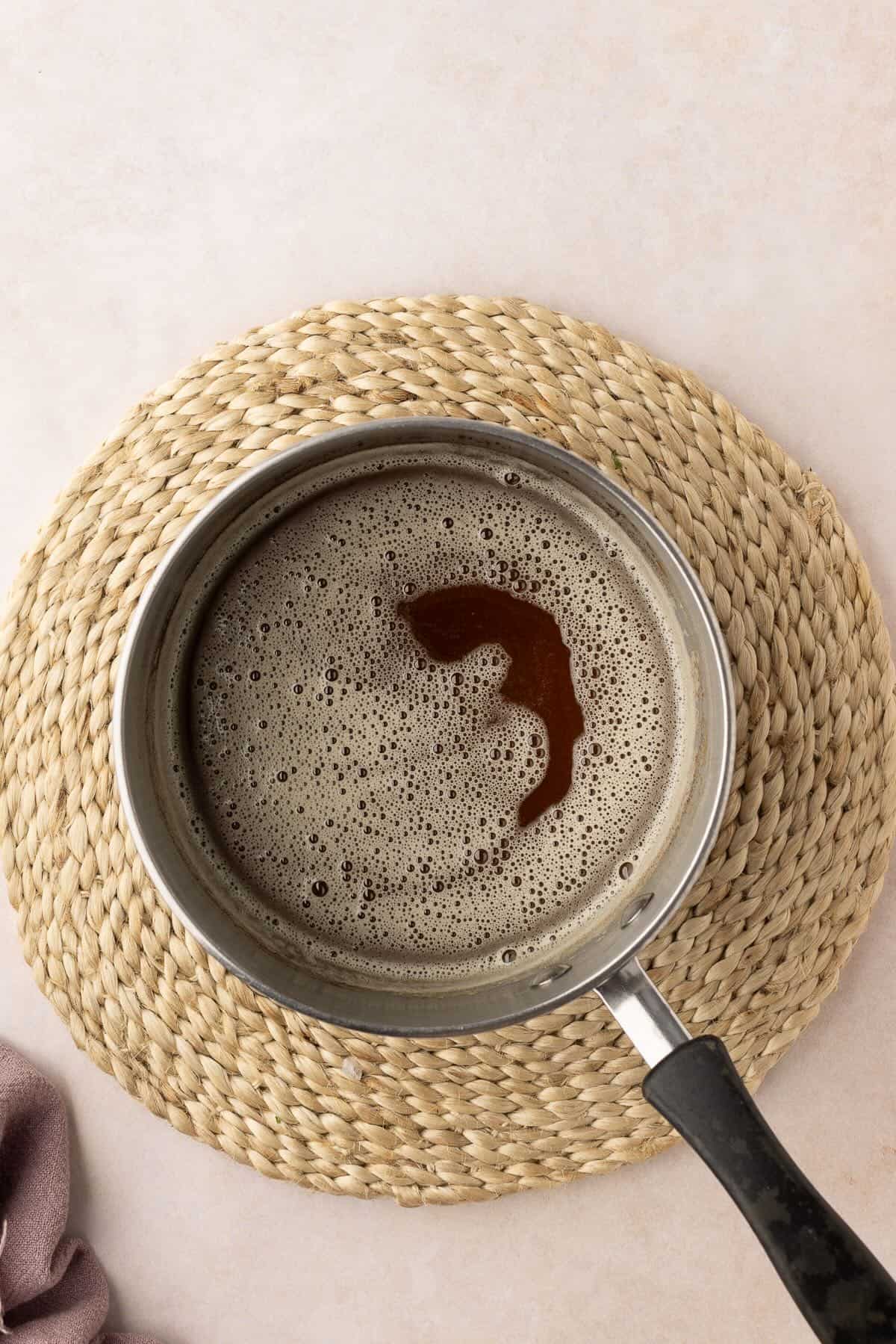 Making browned butter in a saucepan. 