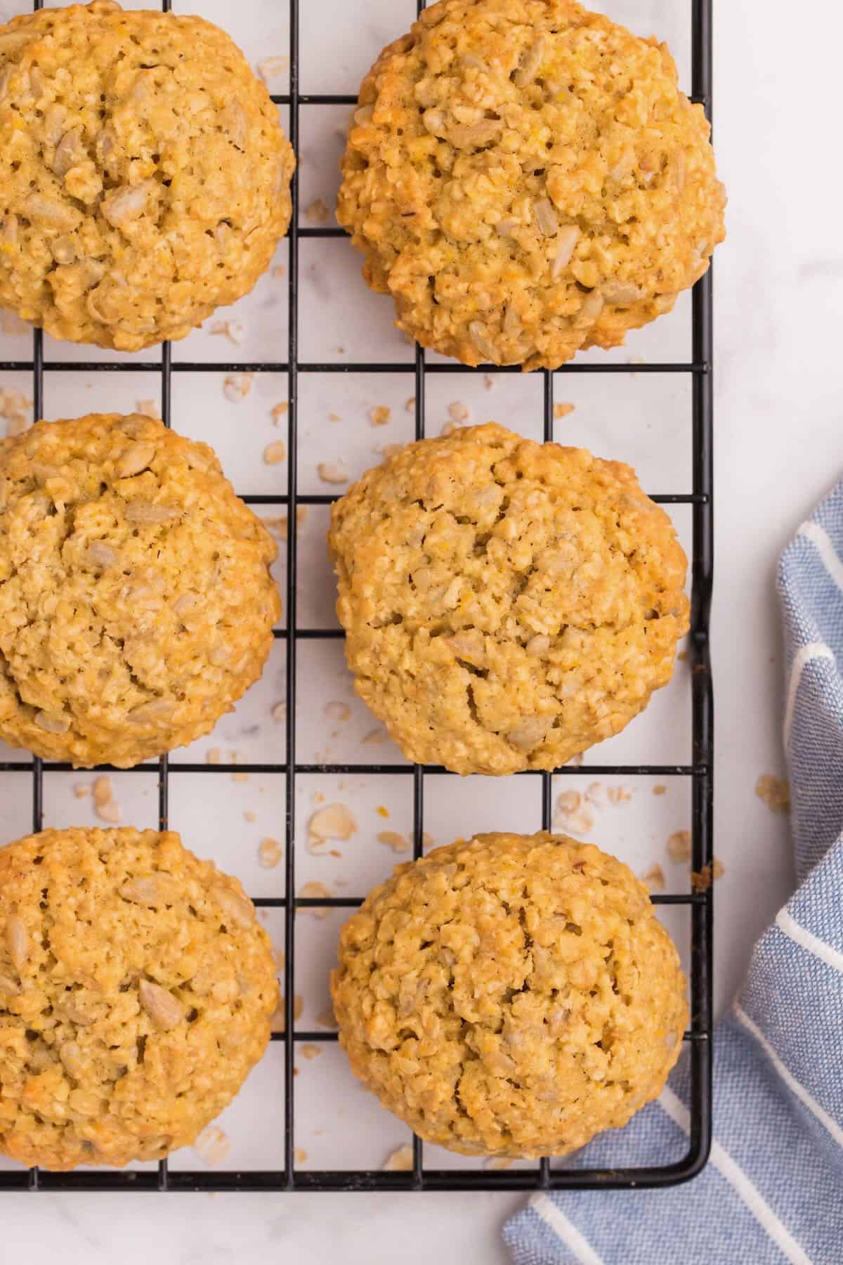 Sunflower cookies cooling on a wire baking rack. 