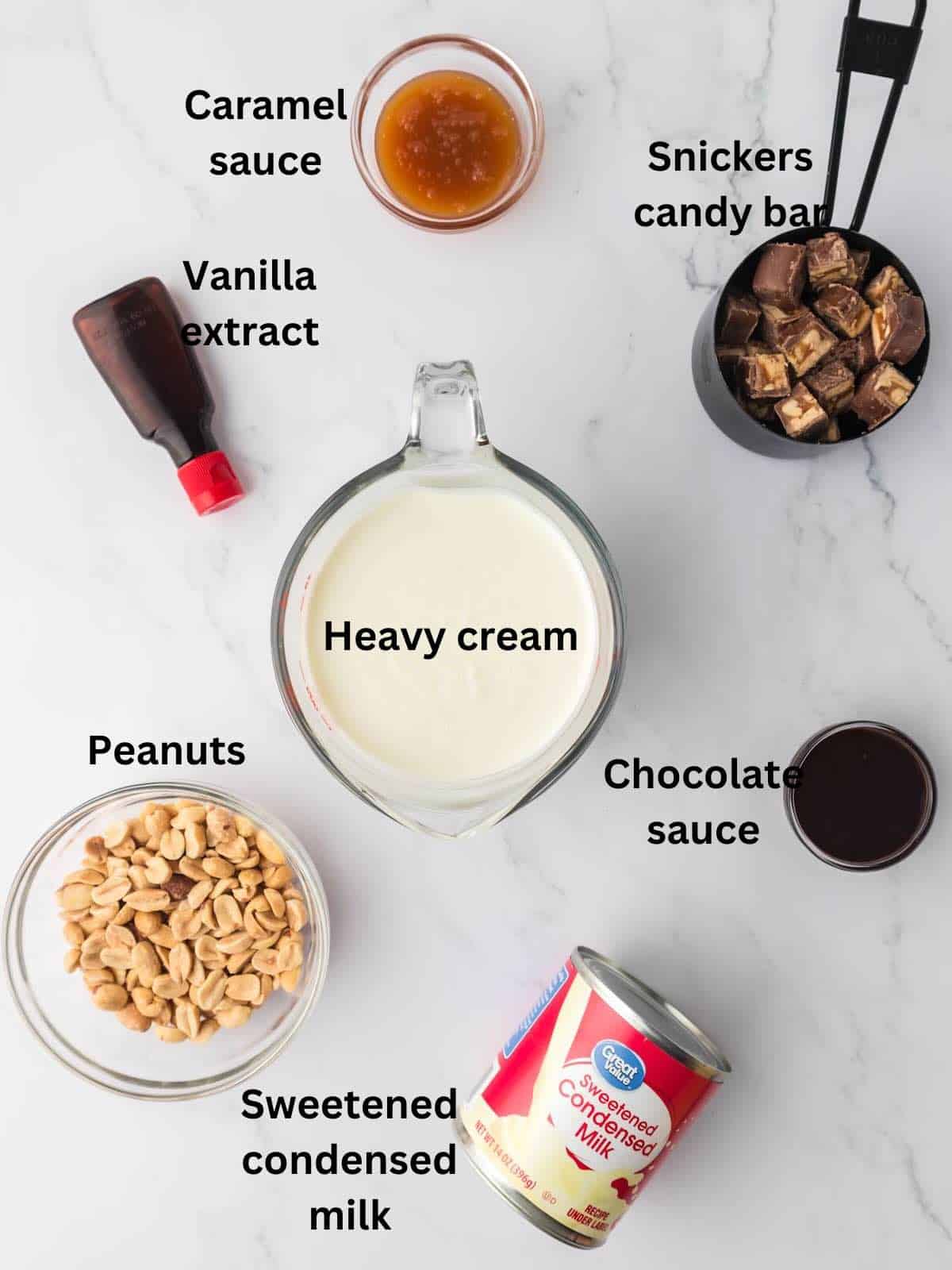 Ingredients to make homemade ice cream including heavy cream and sweetened condensed milk. 