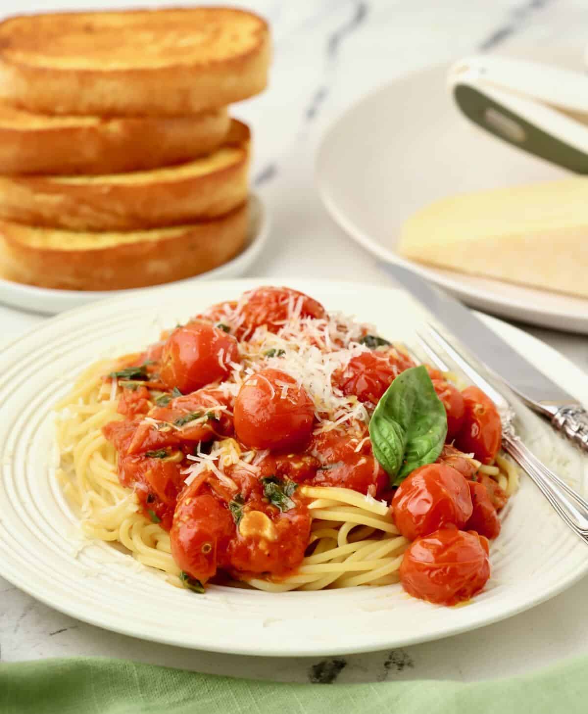 Cherry tomato sauce served over spaghetti and topped with grated parmesan cheese. 