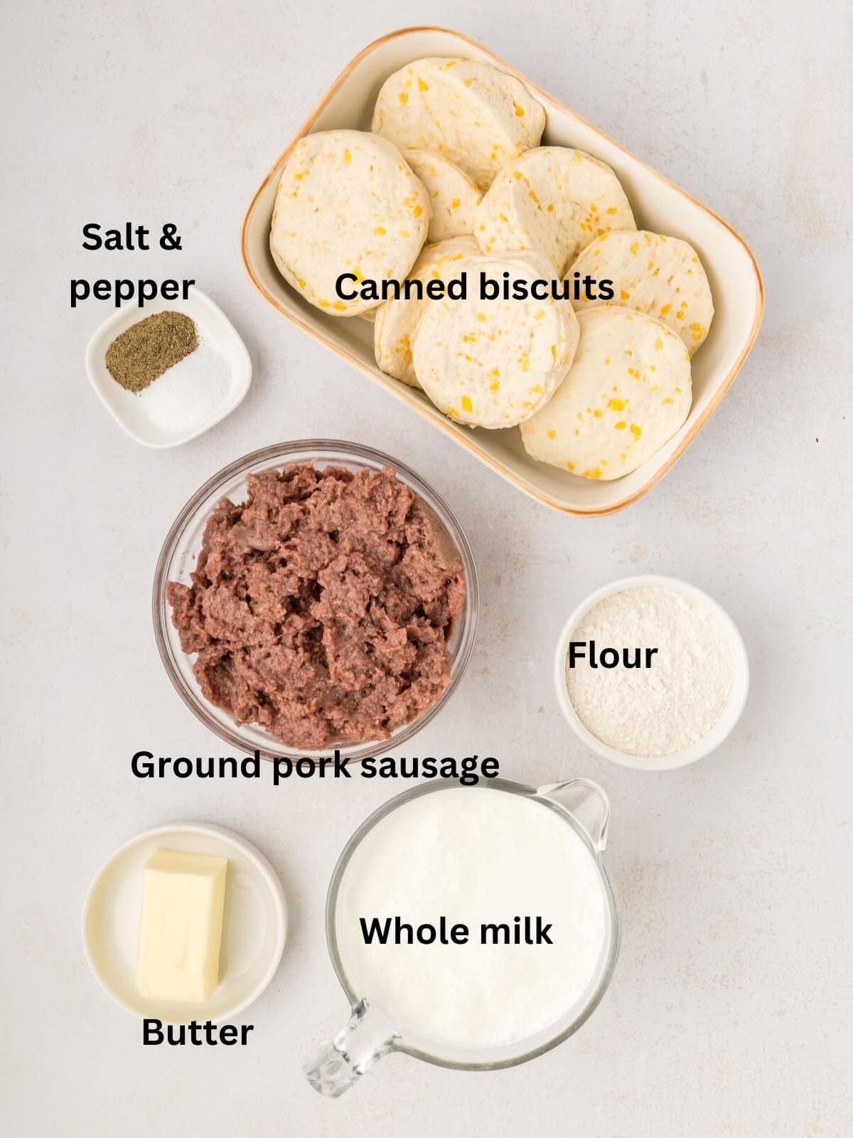 Ingredients for sausage gravy breakfast casserole include biscuits, sausage, flour, and milk. 