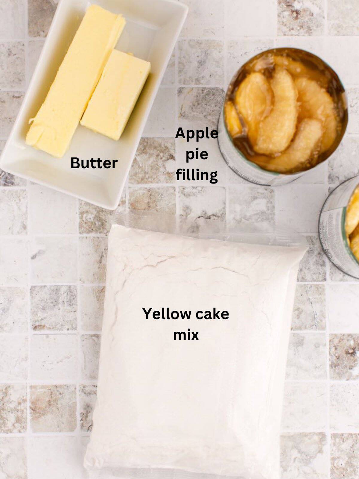 Ingredients for apple cobbler include cake mix, apple pie filling, and butter. 