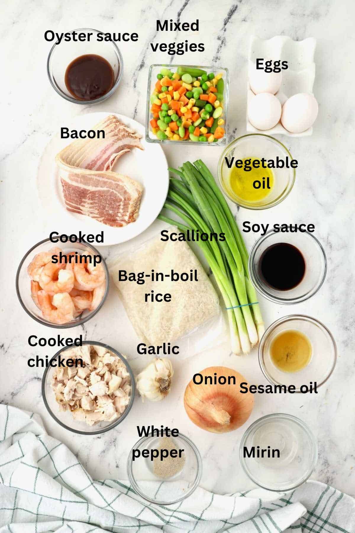 Ingredients for fried rice includes chicken, shrimp, rice, scallions, eggs, and oyster sauce. 