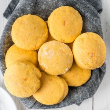 A basket of sweet potato biscuits made with buttermilk.
