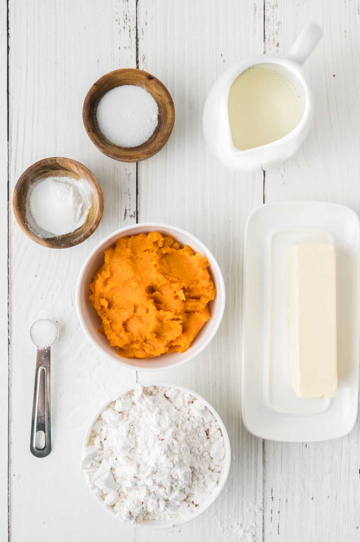 Ingredients for sweet potato biscuits include mashed sweet potatoes, flour, butter and buttermilk. 