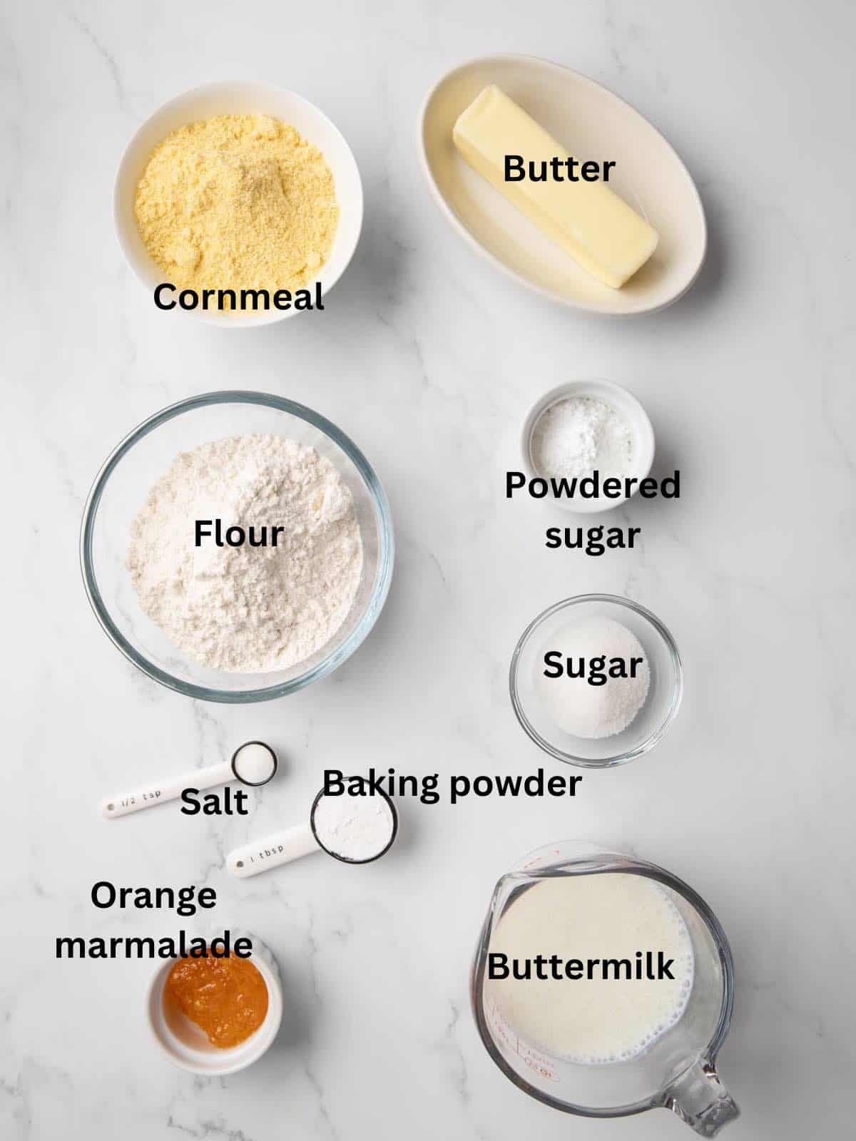 Biscuit ingredients including flour, cornmeal, butter, buttermilk and baking powder. 
