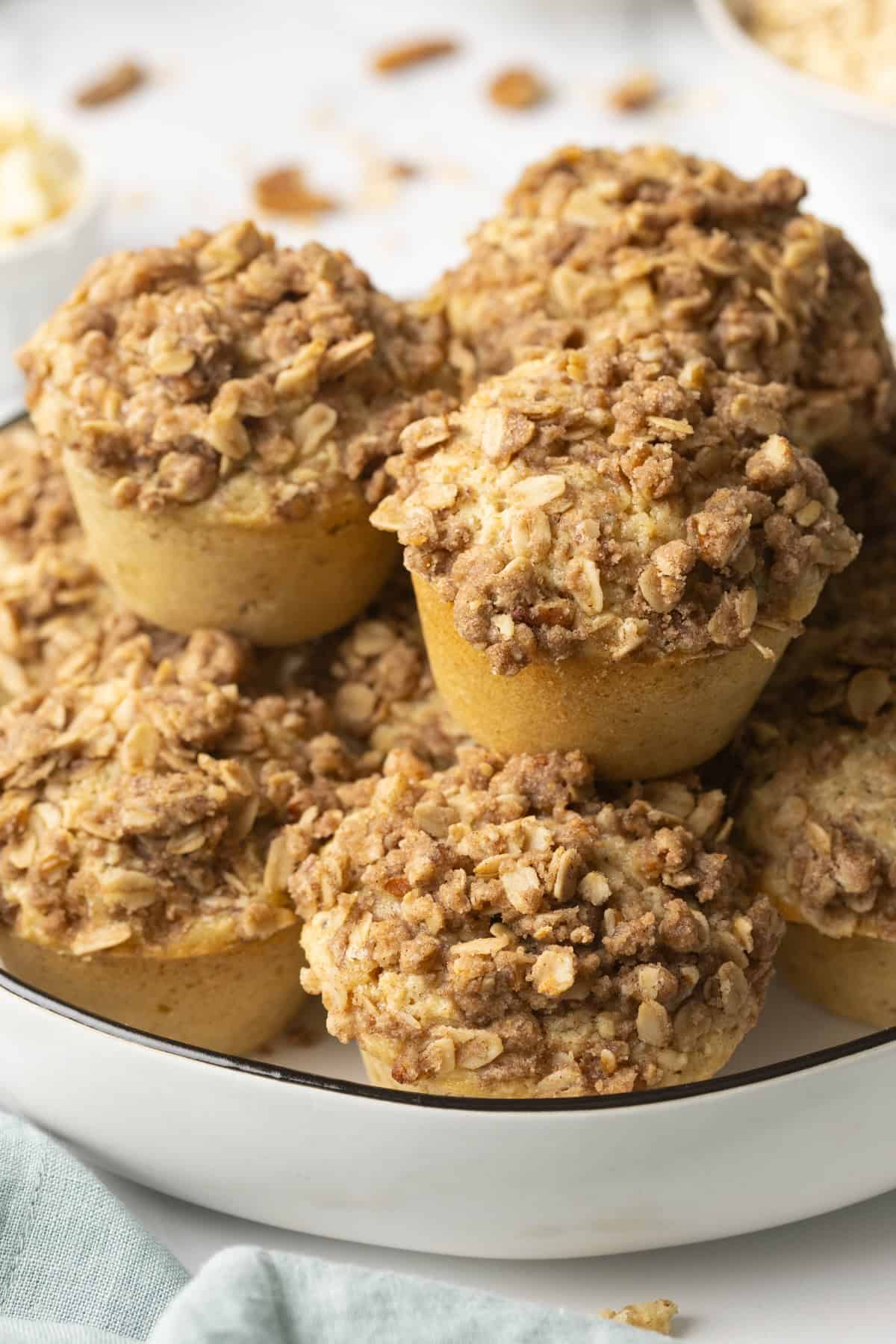 A stack of freshly baked cinnamon oatmeal muffins ready to serve. 